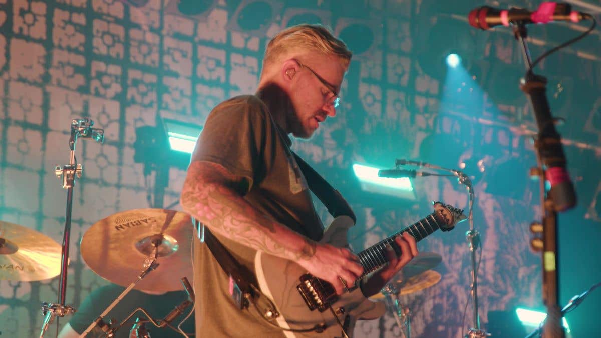 Paul Waggoner of Between the Buried and Me playing his signature Ibanez at an interview with American Musical Supply
