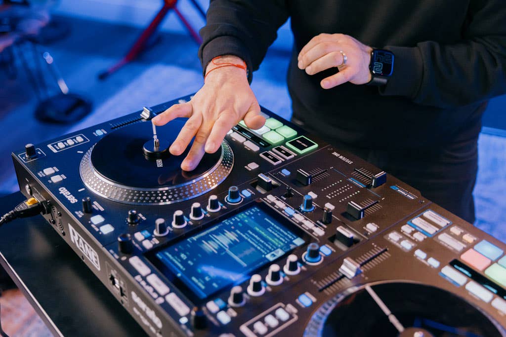 Image of a DJ performing on a Rane System One