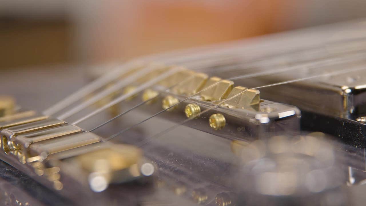 How to adjust intonation on a guitar bridge when first unboxing AMS